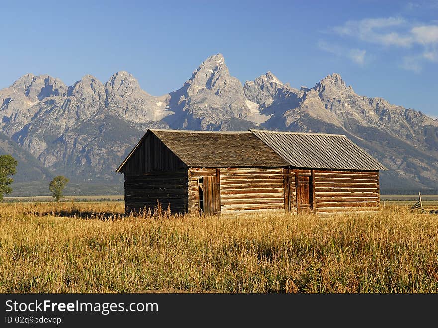 Barn in wyoming with mountains. Barn in wyoming with mountains