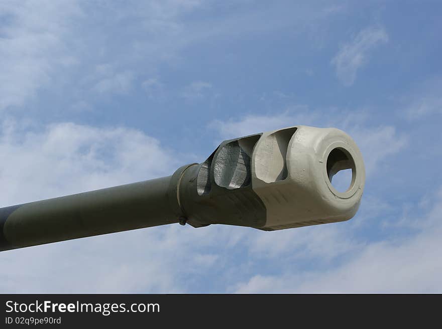 Cannon of modern battle tank against the blue sky, Russia. Cannon of modern battle tank against the blue sky, Russia