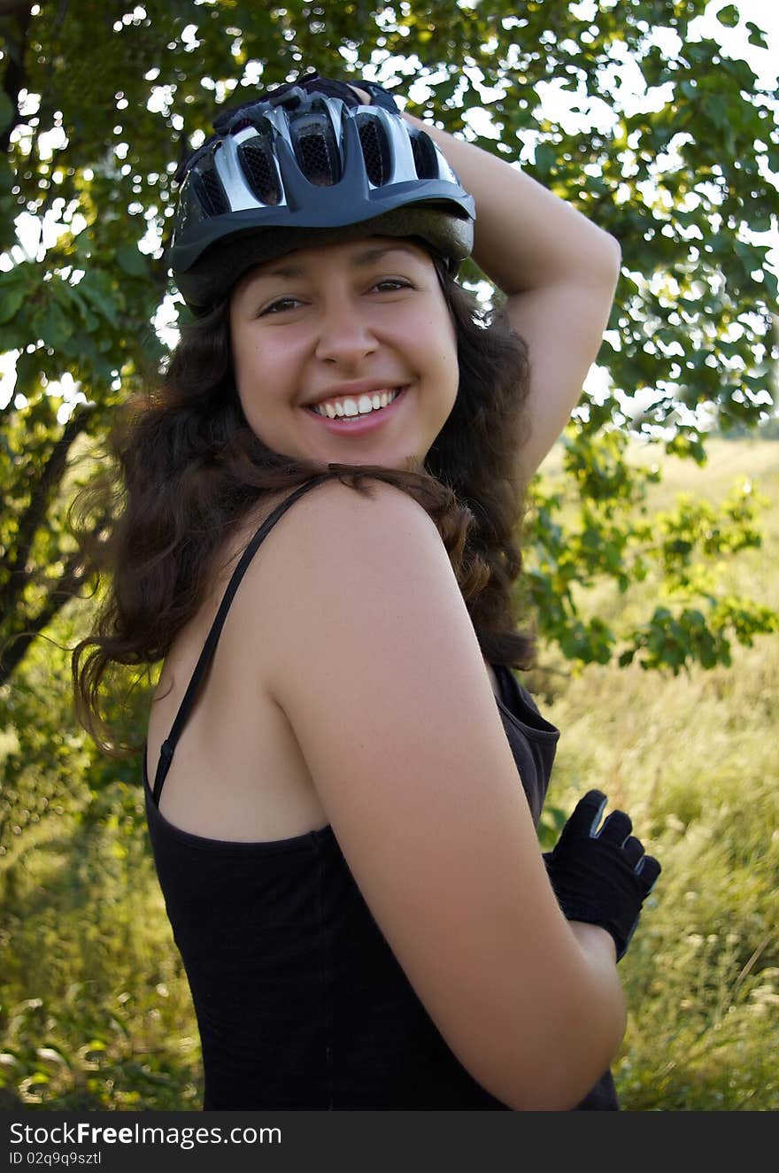 Smiling Girl In Bicycle Helmet