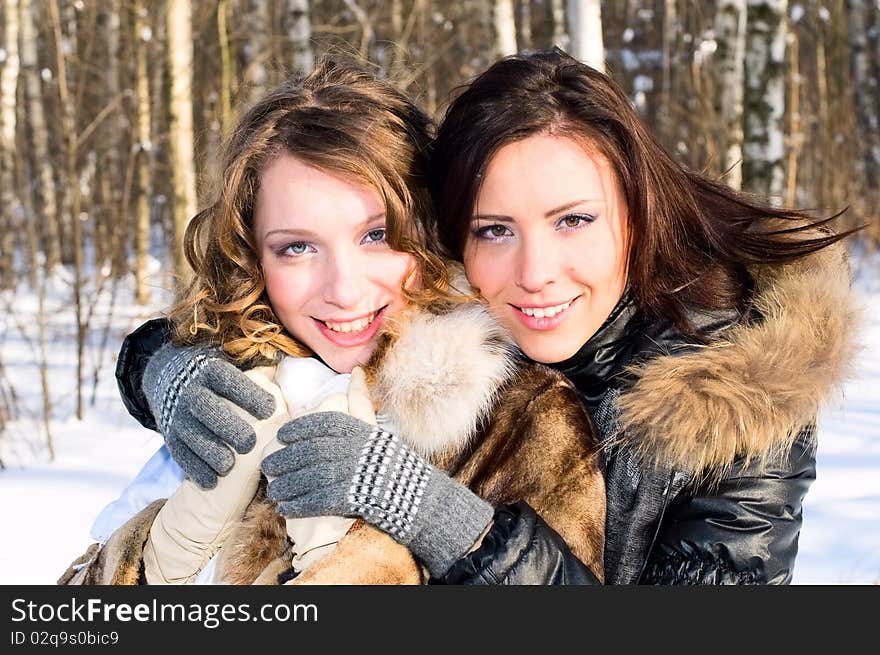 Portrait of young smiling women