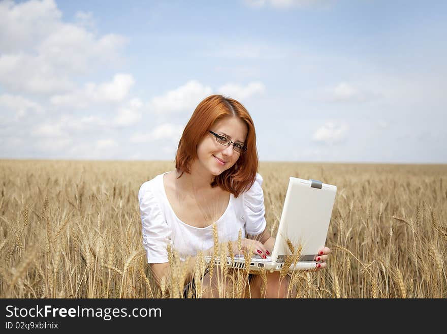 Businesswomen In White With Notebook At Wheat Fiel