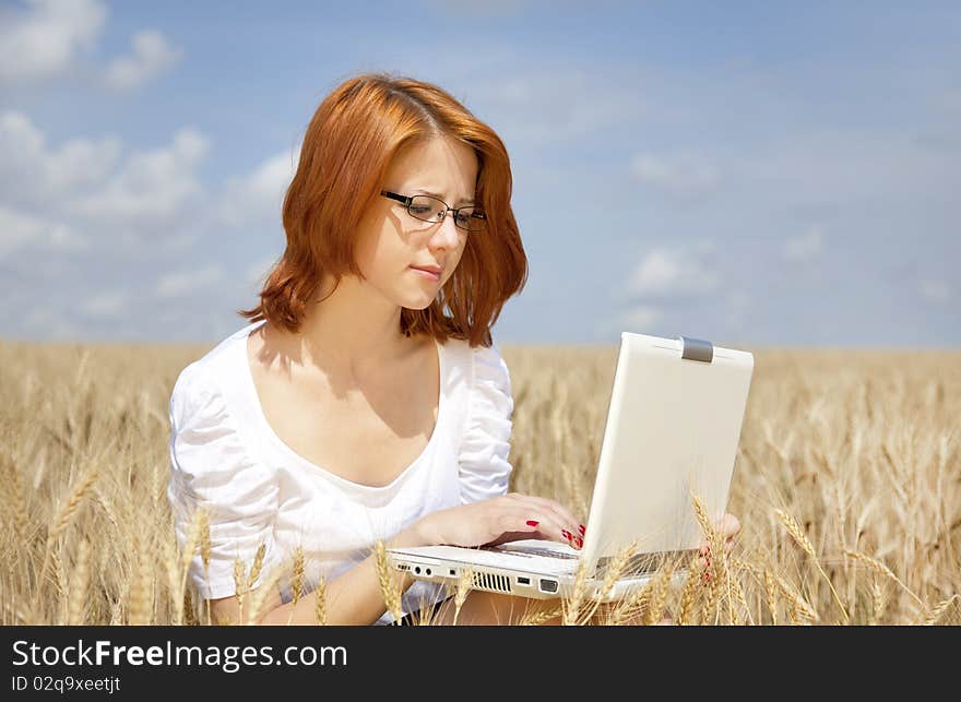 Businesswomen In White With Notebook At Wheat Fiel