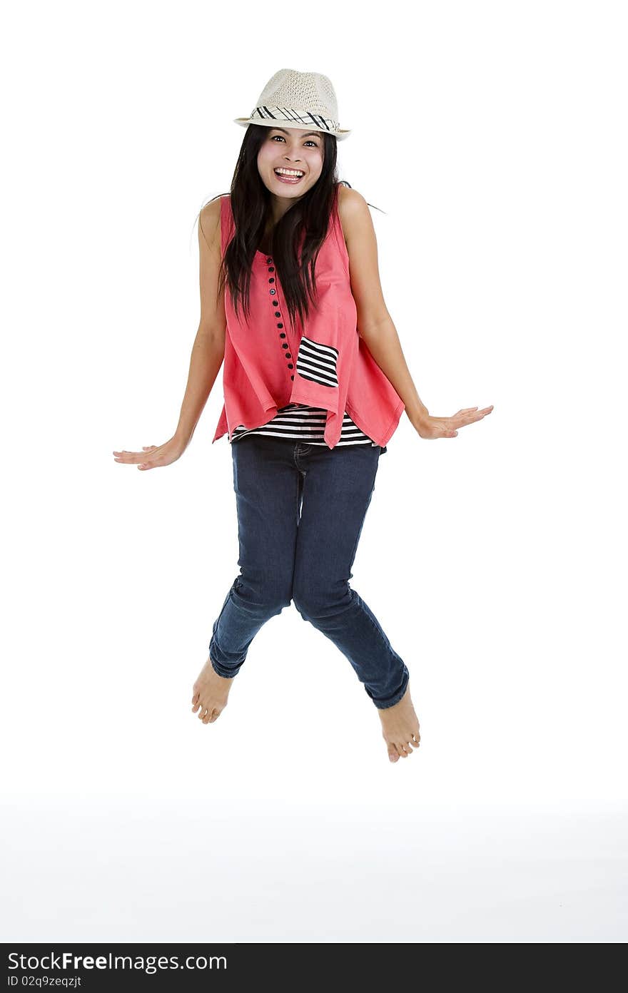 Beautiful, young woman jumping isolated on white background. Beautiful, young woman jumping isolated on white background