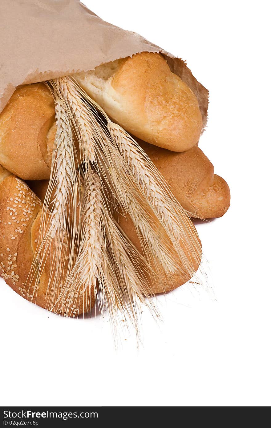 Isolated bread in paper packet on white