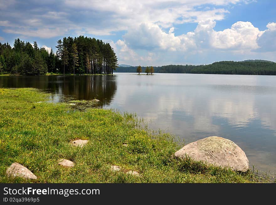 Lake with forest in Rodopi mountine, Bulgaria