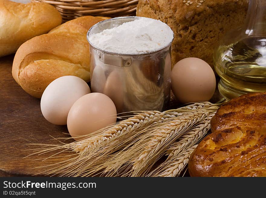 Set of bakery products on wood board