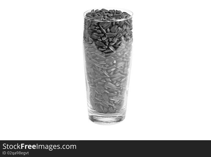 Sunflower seeds in glass, black&white