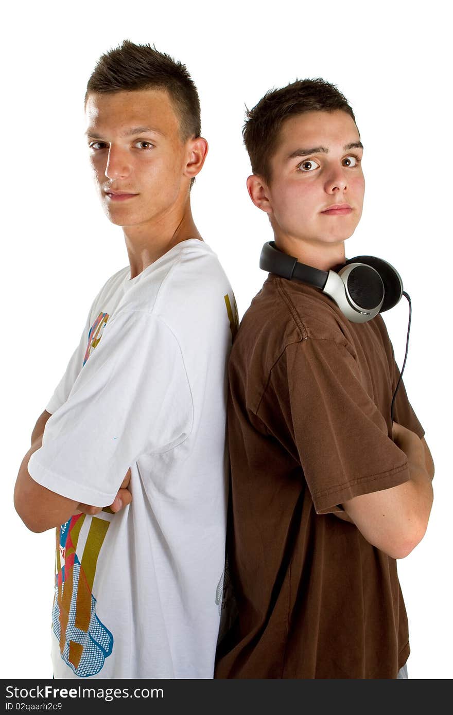 Two young fresh teenagers acting as djs at a party scene. Isolated over white. Two young fresh teenagers acting as djs at a party scene. Isolated over white.