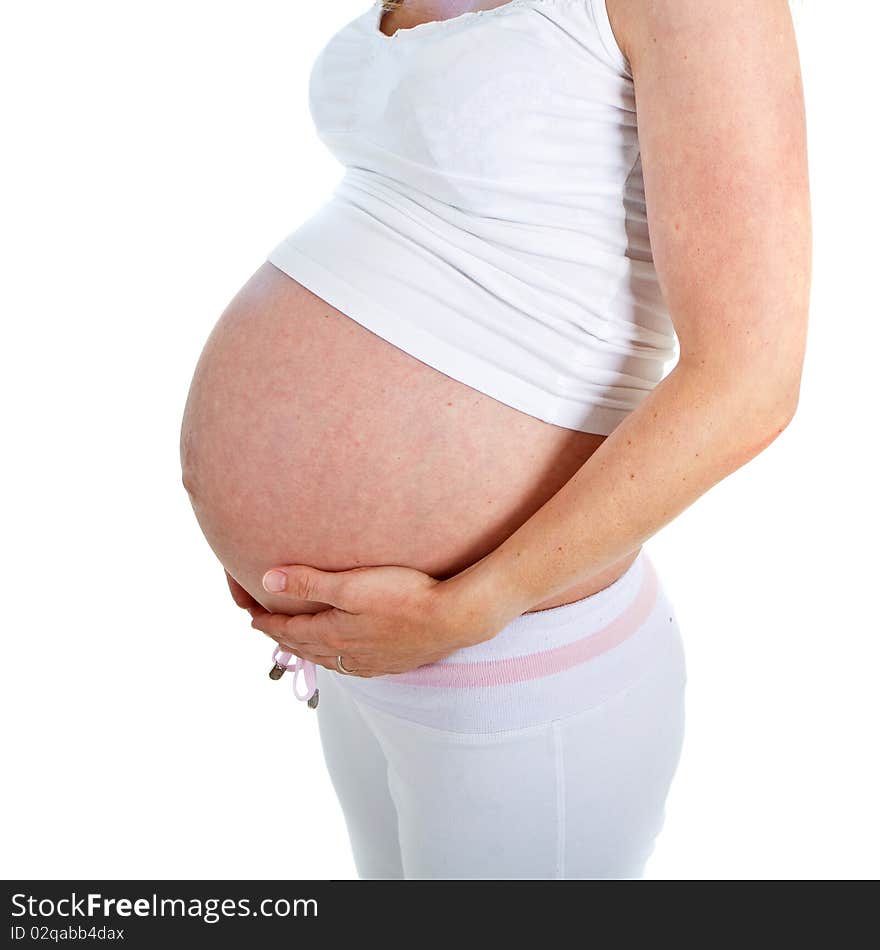 Young fresh pregnant woman isolated over white background. Young fresh pregnant woman isolated over white background.