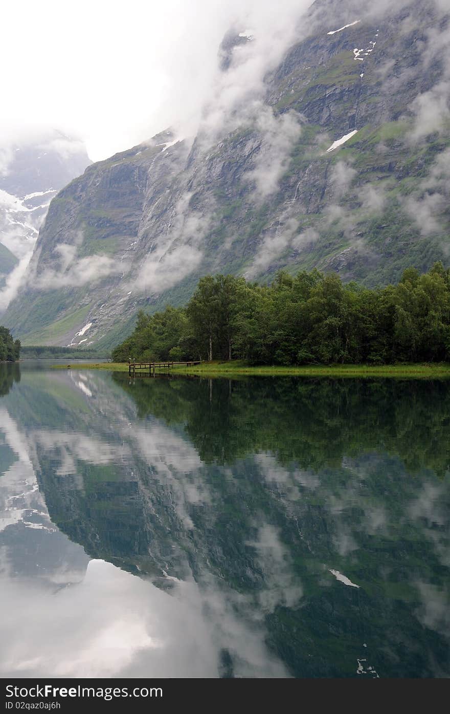 Reflections in Lovatnet lake, Norway