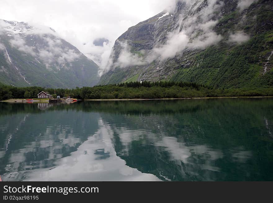 Reflections in Lovatnet lake, Norway