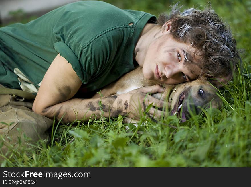 Portrait of a young man with his best friend - dog. Portrait of a young man with his best friend - dog