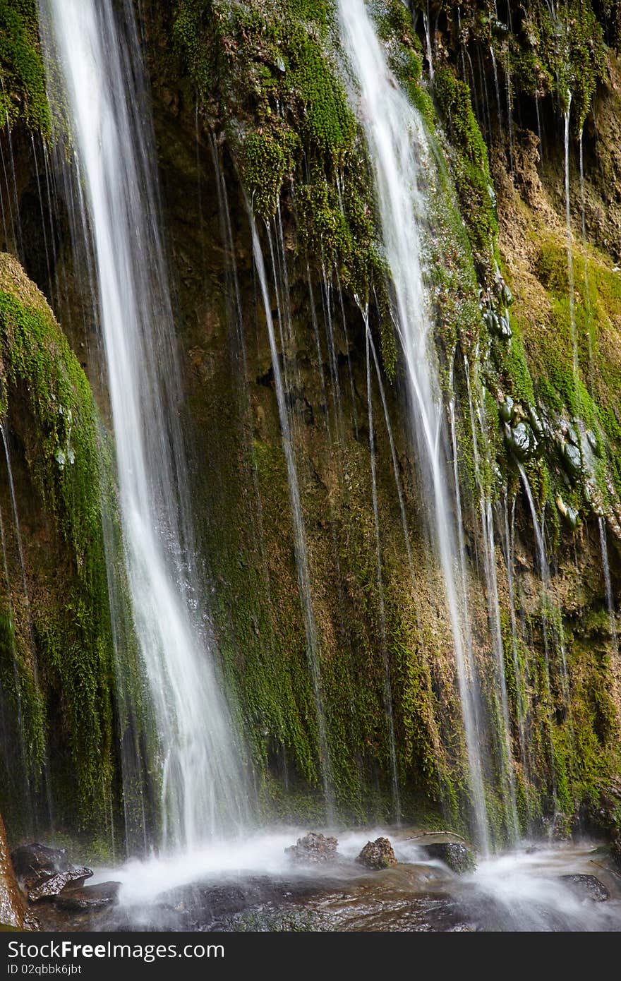 Waterfall on a spring in forest