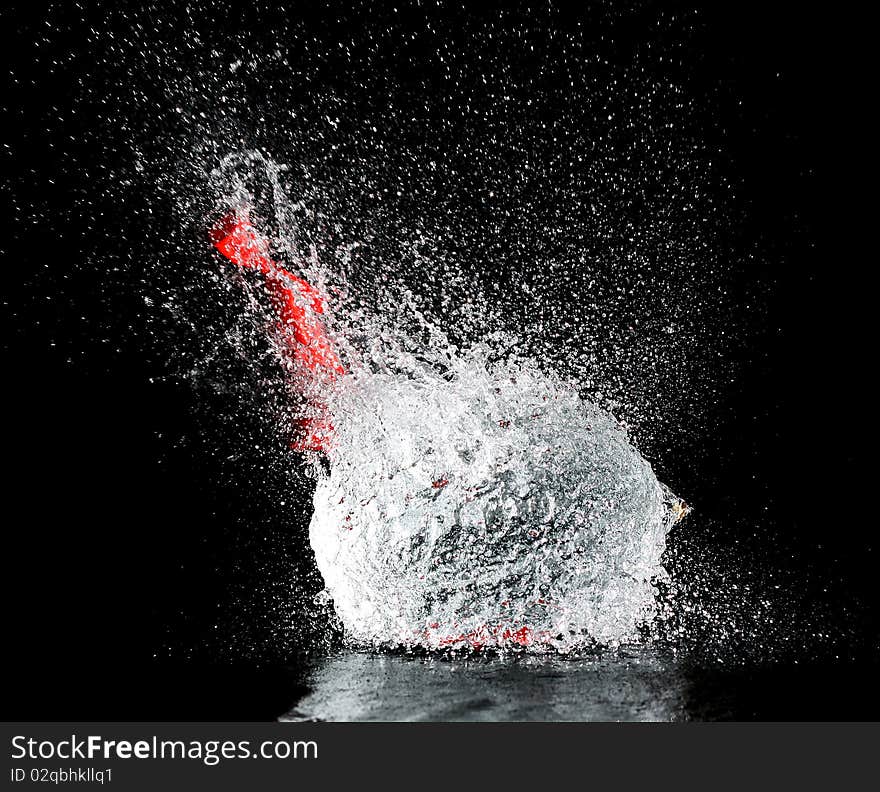 Inflatable balloon full of water broke and sprayed water. Inflatable balloon full of water broke and sprayed water