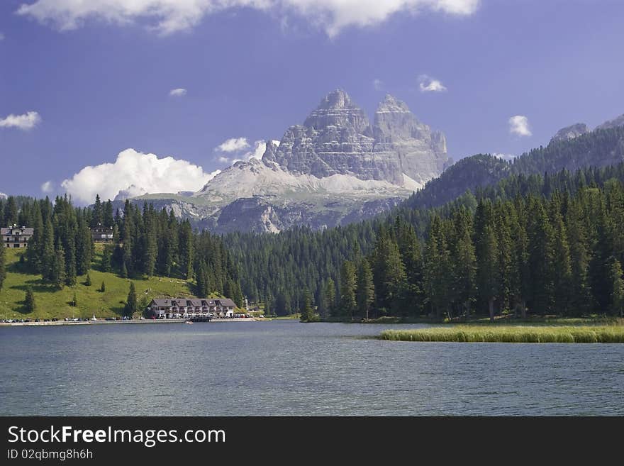 Alps mountain lake in italy, lago di misurina with tre cime di lavaredo in backgroud, in summer