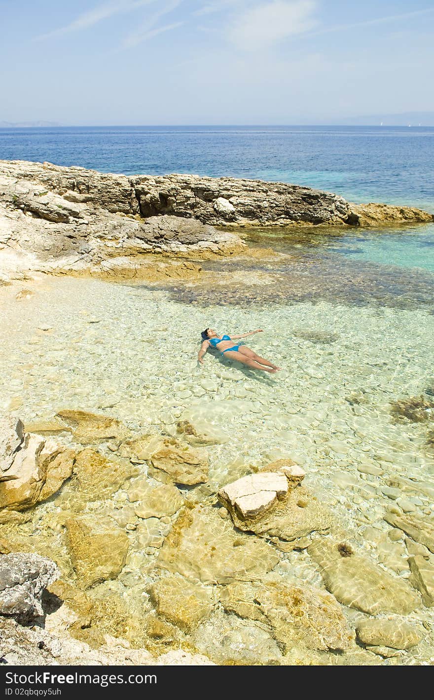 Woman relaxing in sea