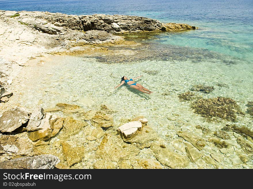 Woman relaxing in sea