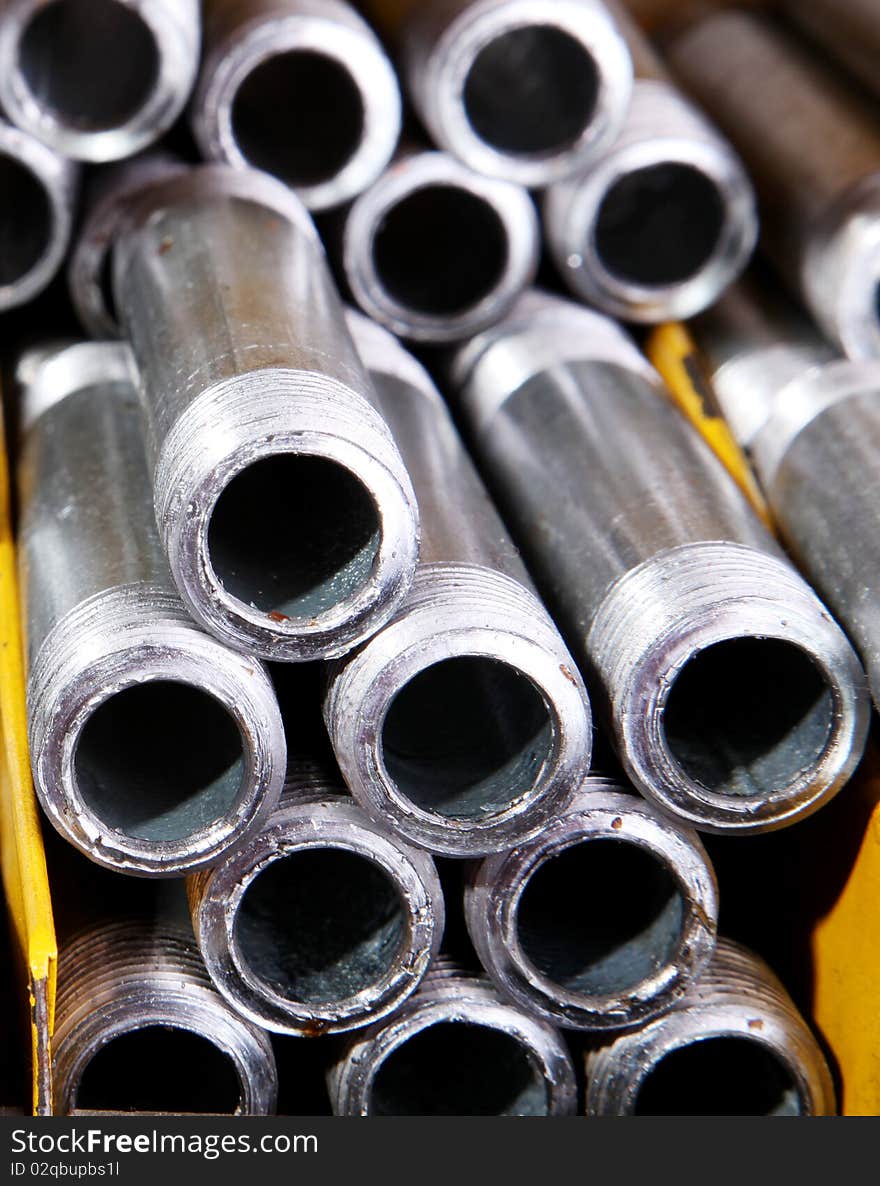 Iron pipes in a shelf, Metallic products