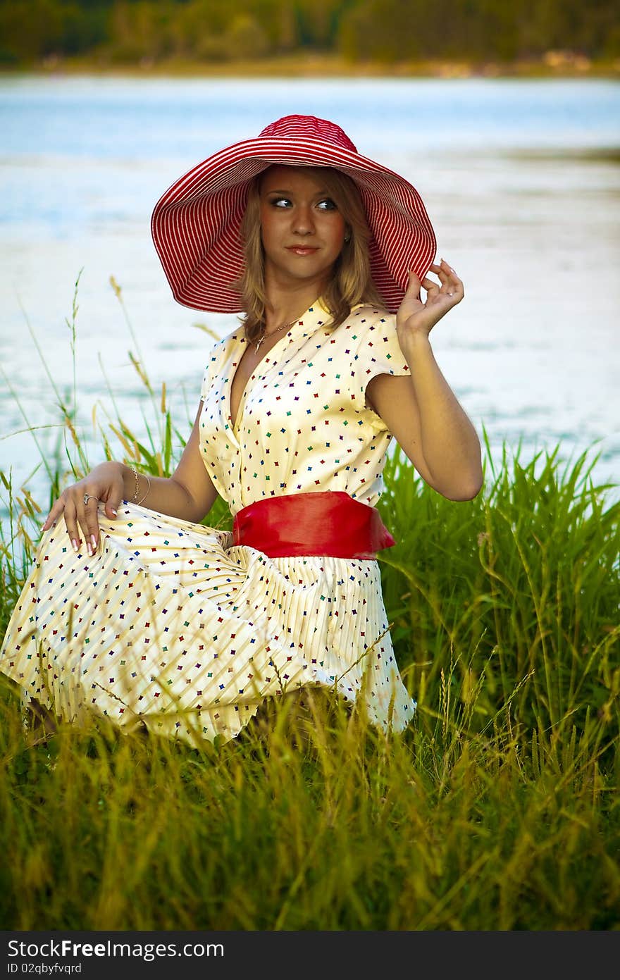 Retro girl resting at the lake. Retro girl resting at the lake