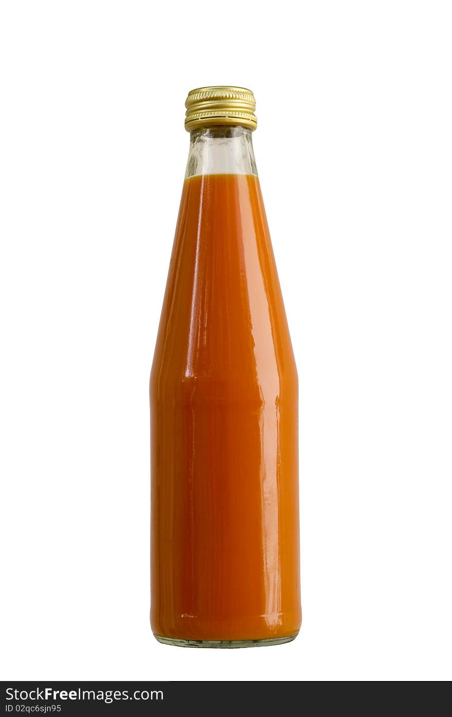 Bottle with a carrot juice is on white