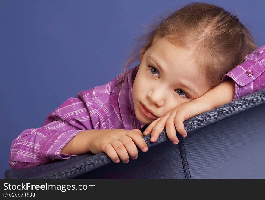 Studio portrait of a cute little girl. diagonal composition.