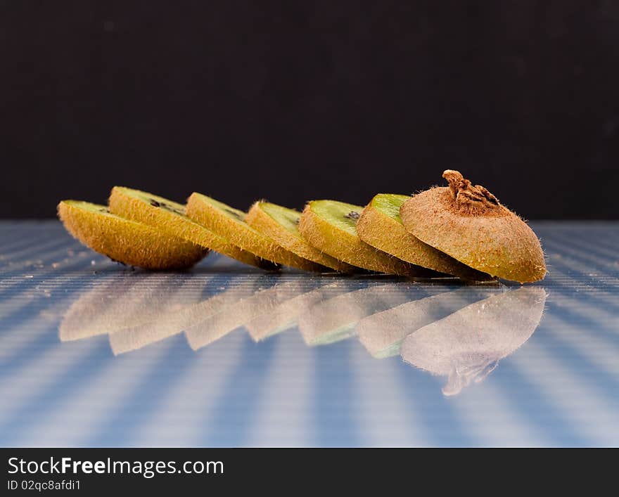 Sliced and Staggered Kiwi on Glass. Sliced and Staggered Kiwi on Glass