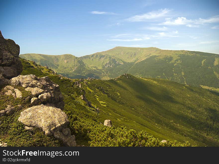 Ukrainian Carpathian mountains landscape panorama with rock cliffs. Ukrainian Carpathian mountains landscape panorama with rock cliffs