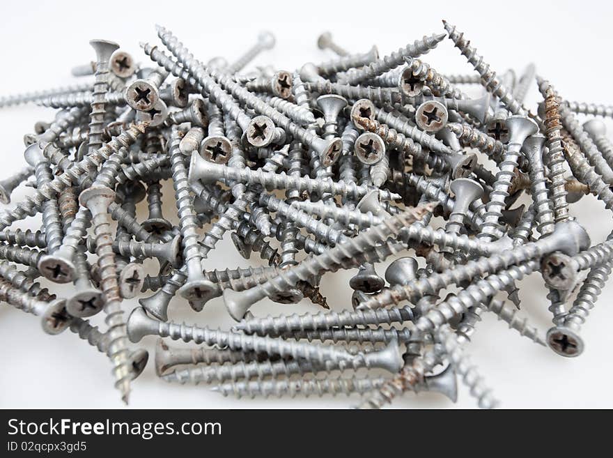 Close up of a pile of metal screws. Close up of a pile of metal screws.