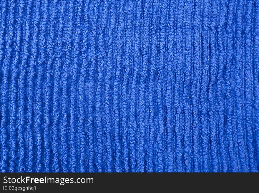 Macro image of blue fabric texture.