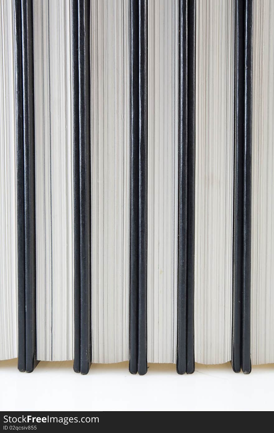 Stack Of Books On The White Background