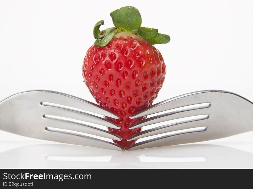 Close up of Strawberry and two forks