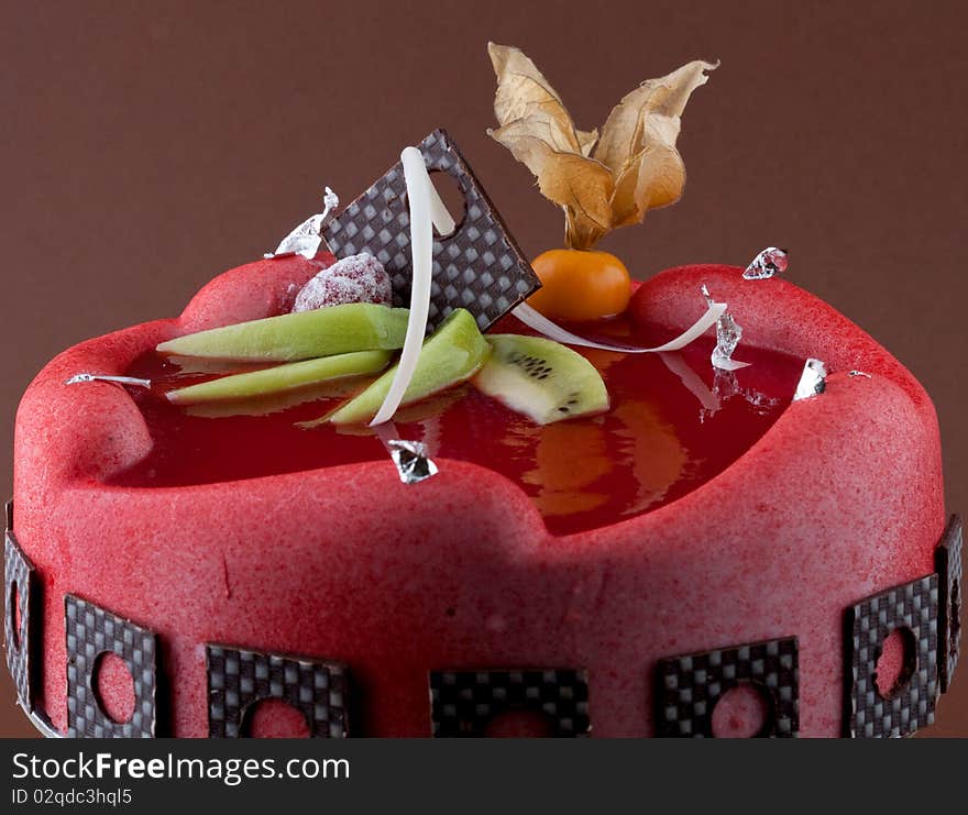 Strawberry cake with brown background