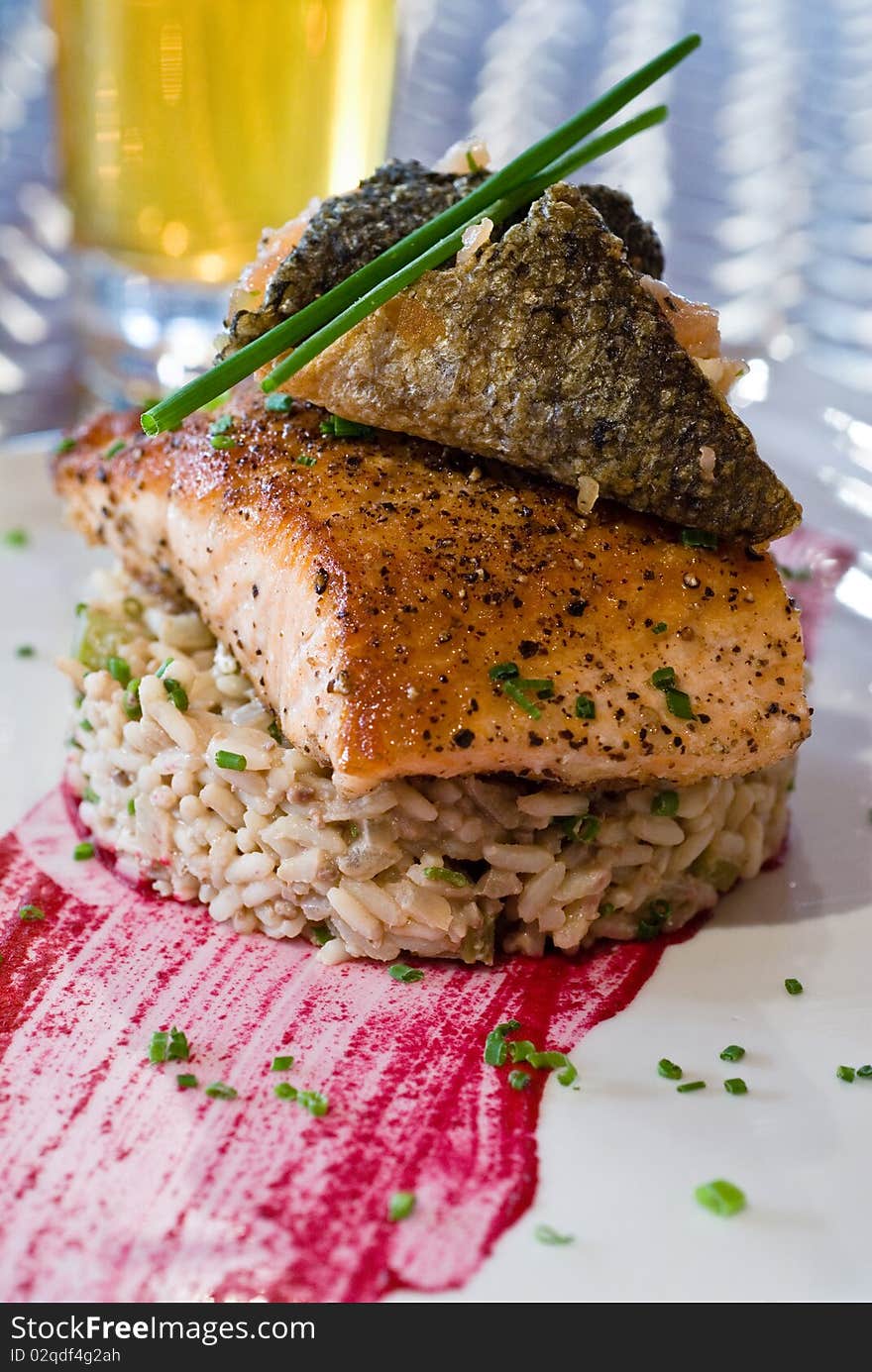 Herb crusted salmon over wild rice pilaf