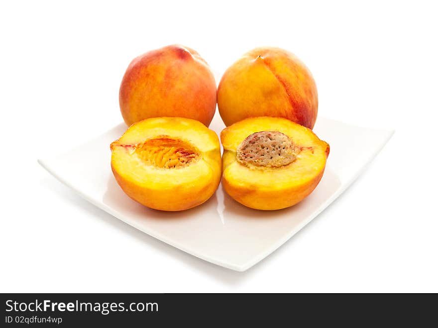 Peaches on plate