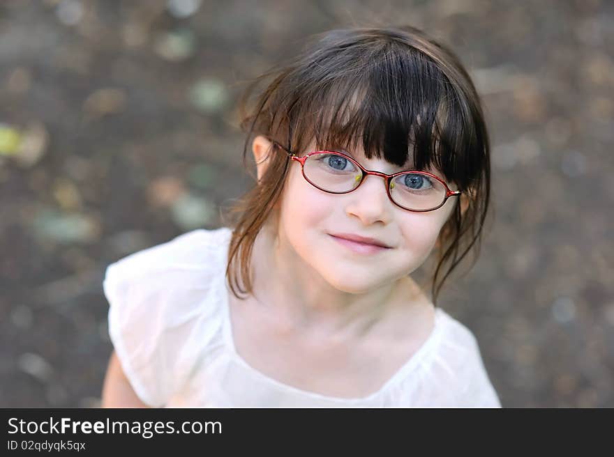 Nice toddler girl looking into the camera