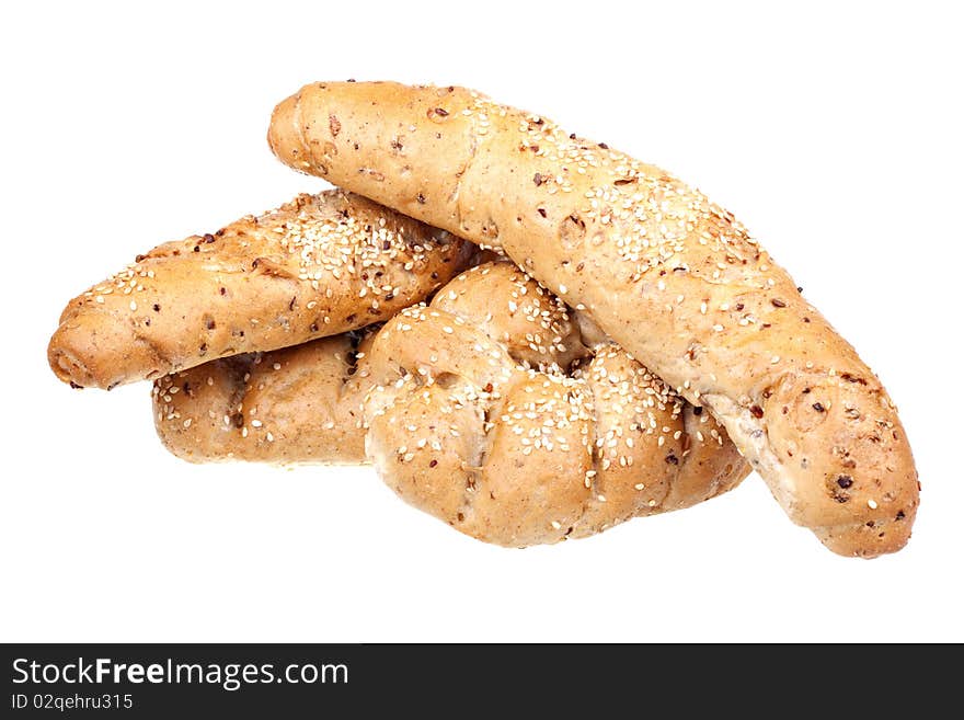 Wholemeal roll on white background