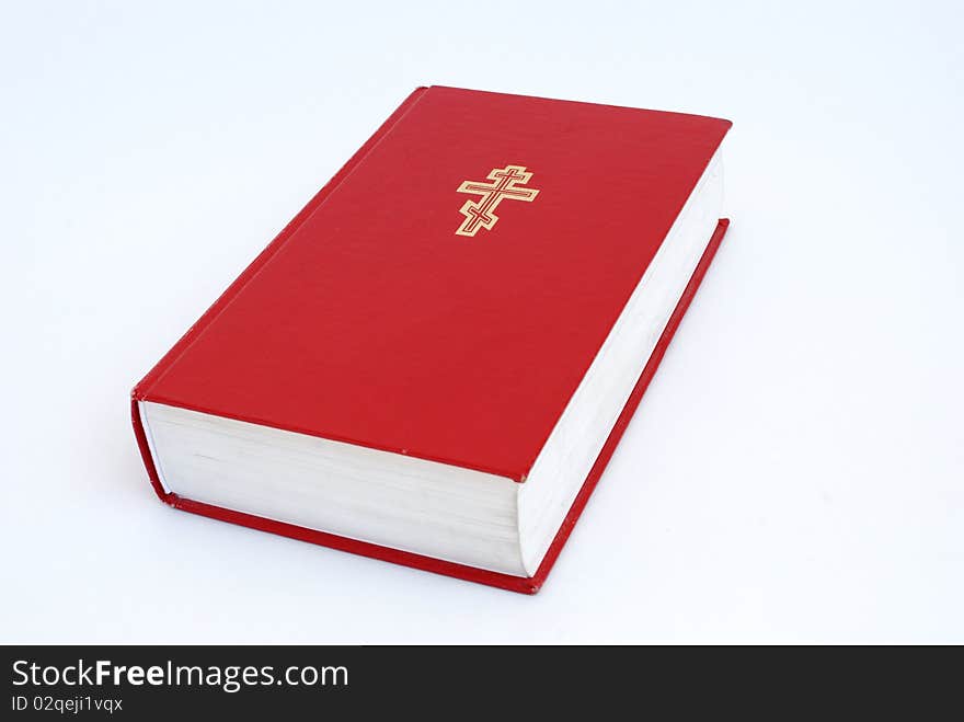 Red book holy bible on white background