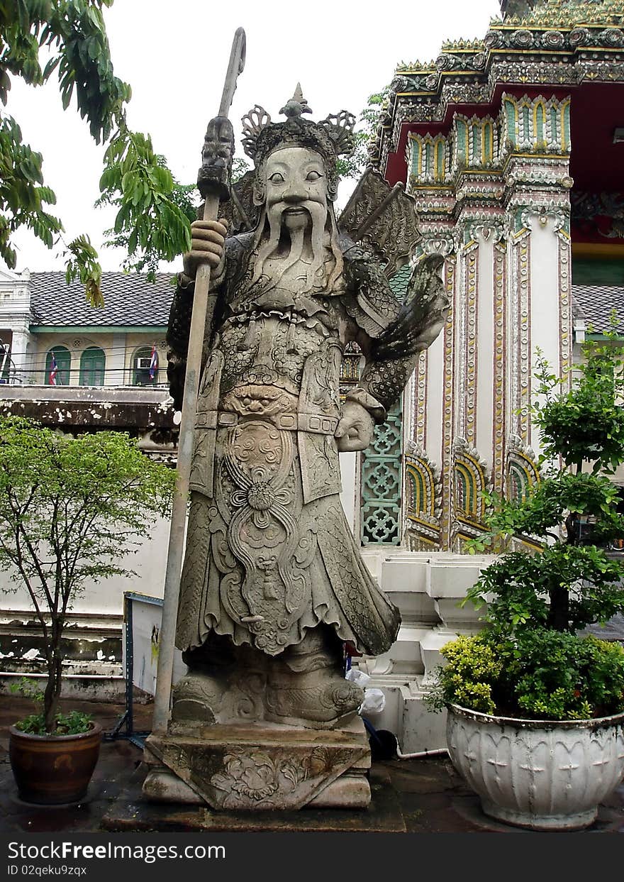 Beautiful Chinease guard infront of the temple gate.Wat Pho Thailand. Beautiful Chinease guard infront of the temple gate.Wat Pho Thailand.