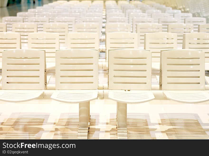 A line of white chairs