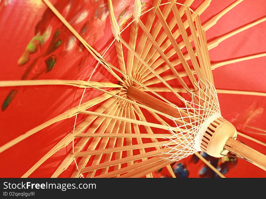 Triple Red umbrella in exhibition hall