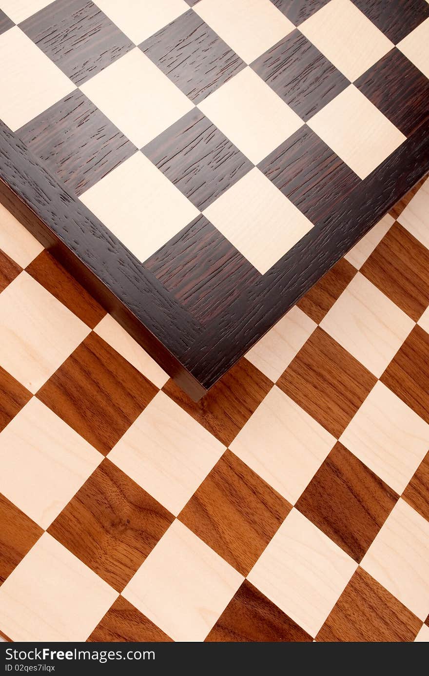 Wooden chess board on white. Wooden chess board on white