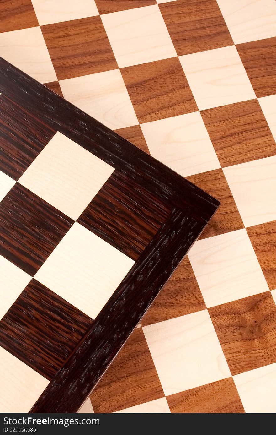 Wooden chess board on white. Wooden chess board on white