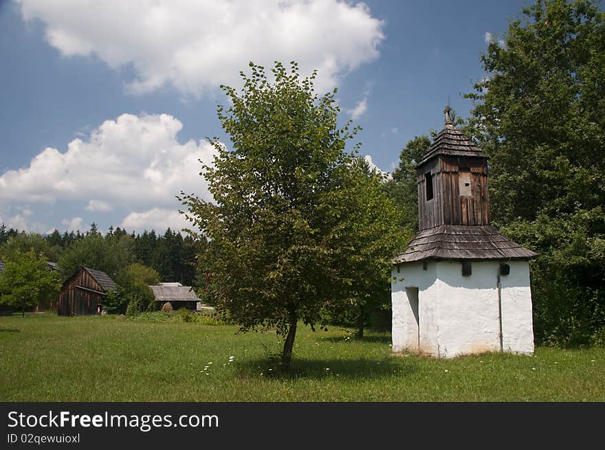 Traditional wooden campanile in slovak rural village. Traditional wooden campanile in slovak rural village