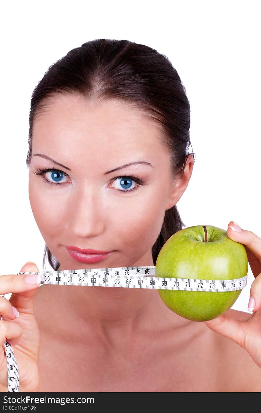 Woman with green apple rounded measuring tape, portrait. Woman with green apple rounded measuring tape, portrait