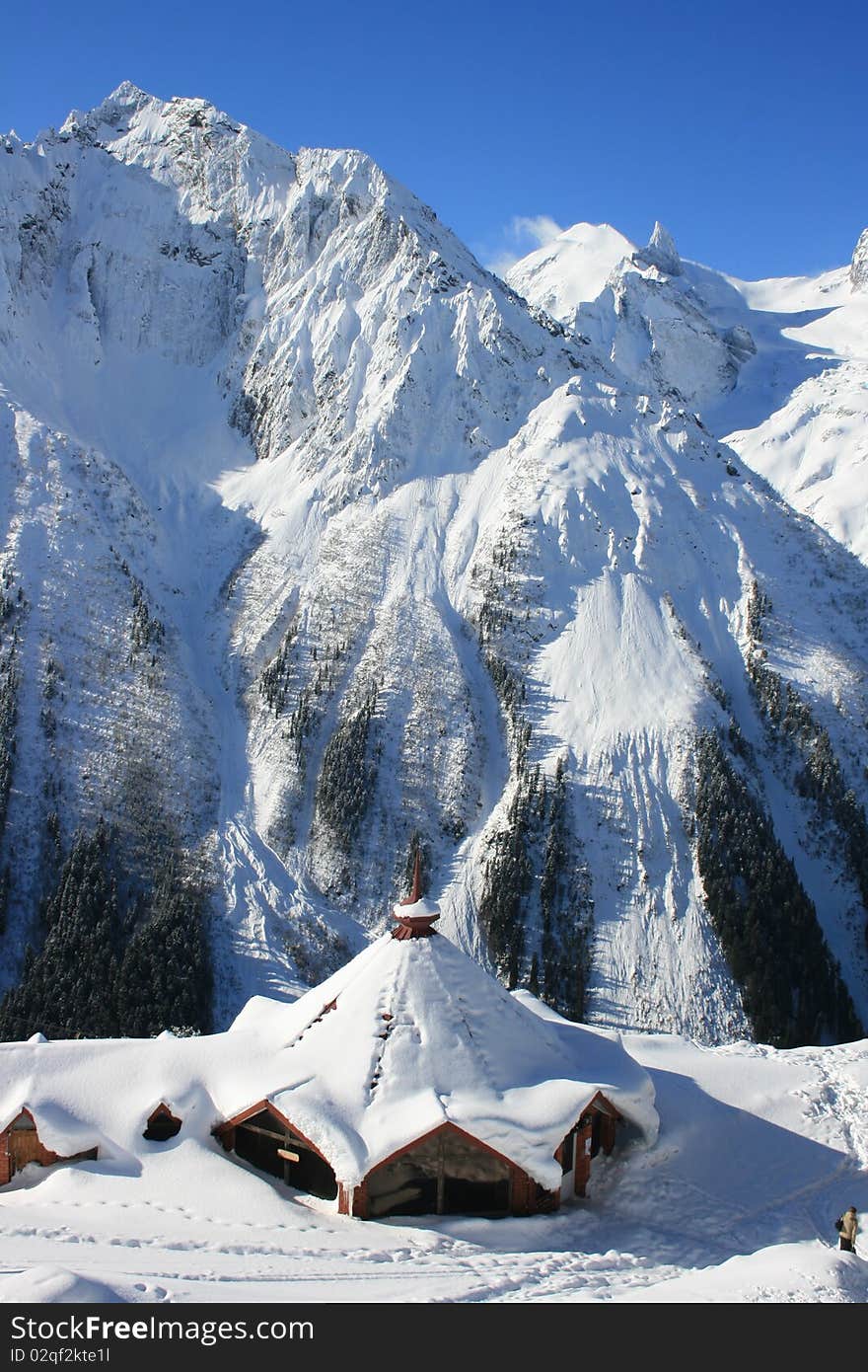 Wood house in mountains