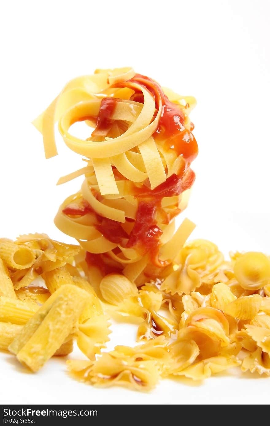 Pasta with sauce on a white background