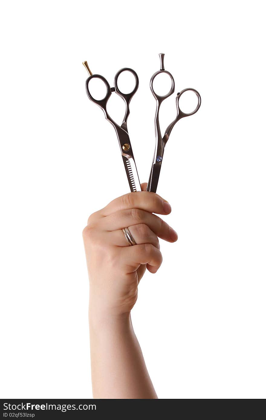 Two scissors in the hand