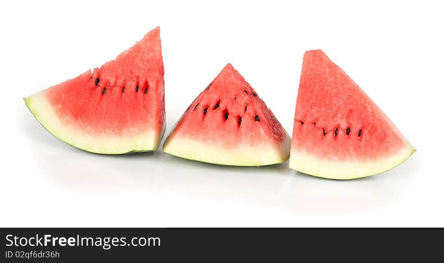 Fresh segment of a watermelon on a white background. Fresh segment of a watermelon on a white background