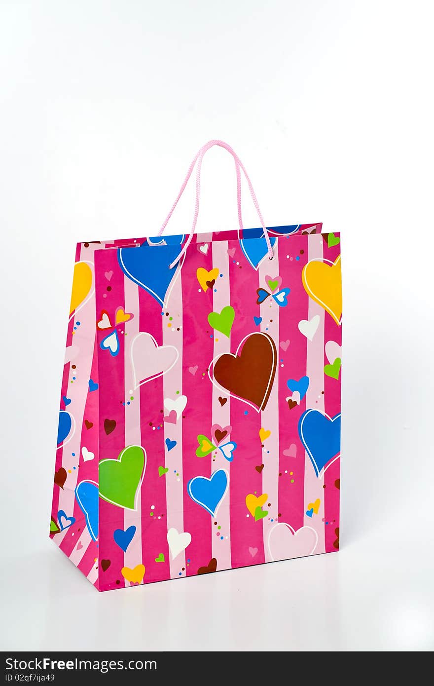 Paper valentine gift bag with hearts