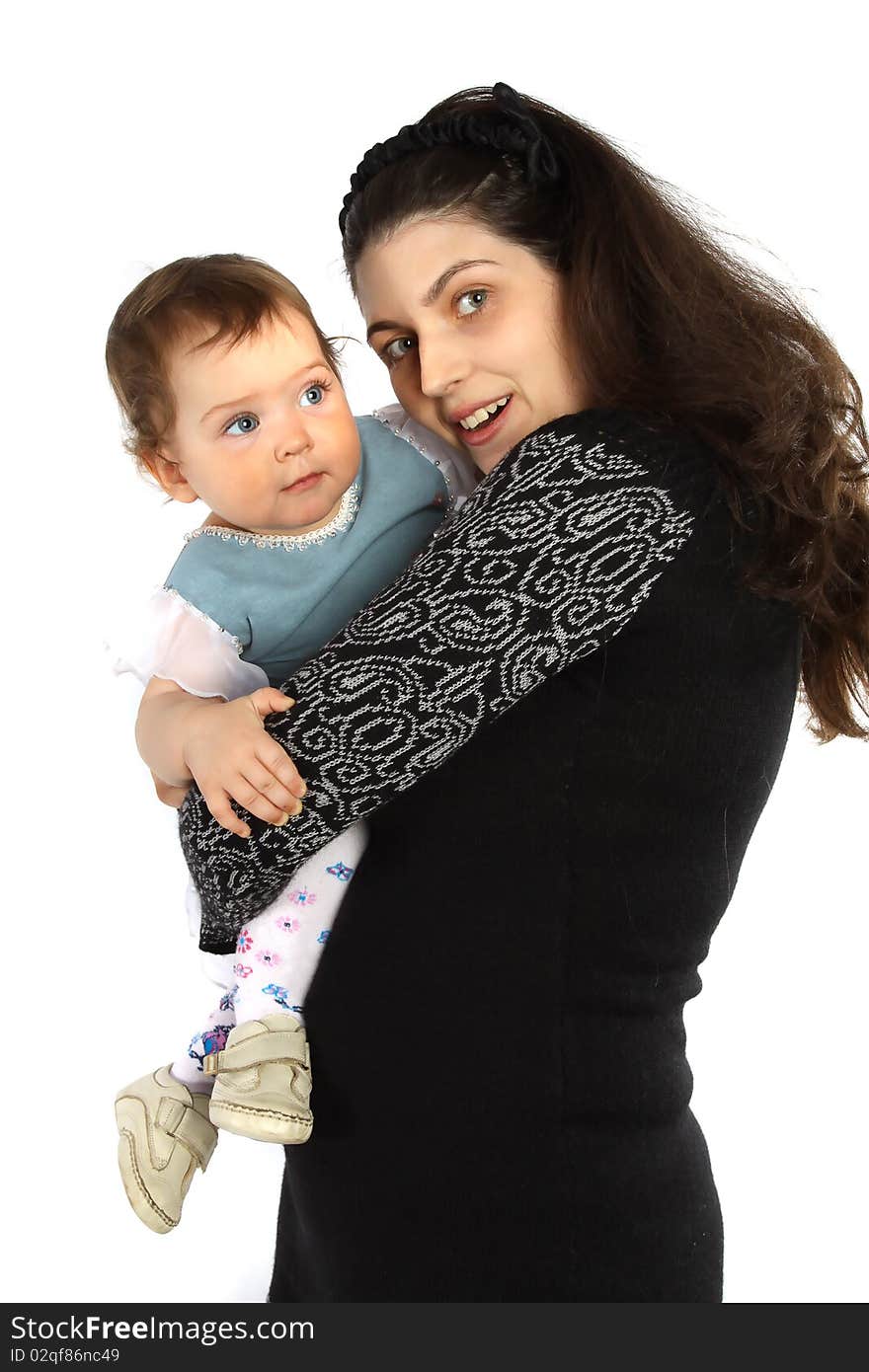 Happiness family. Mother holding baby daughter and laughing